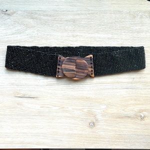 Black beaded and wood clasp belt.